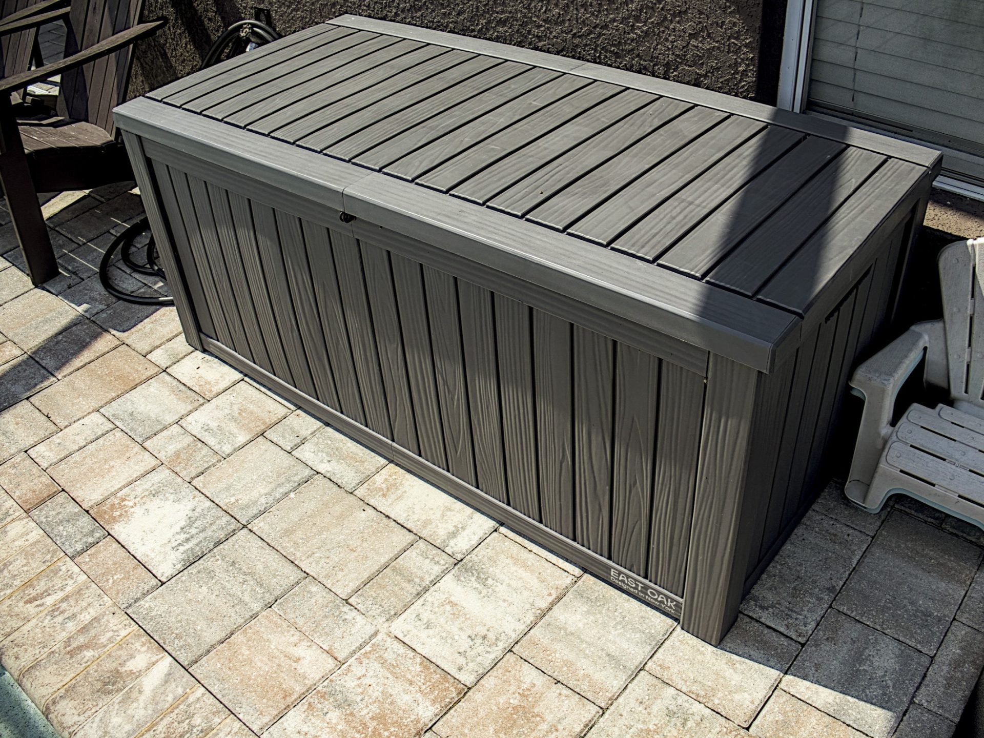 East Oak 150 gallon deck box outdoors by pool -- Techigar