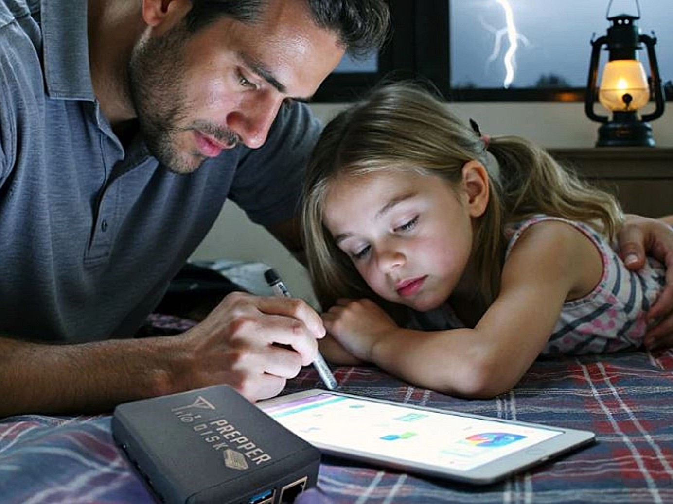 Father with Daughter and Prepper Disk as a survival resource