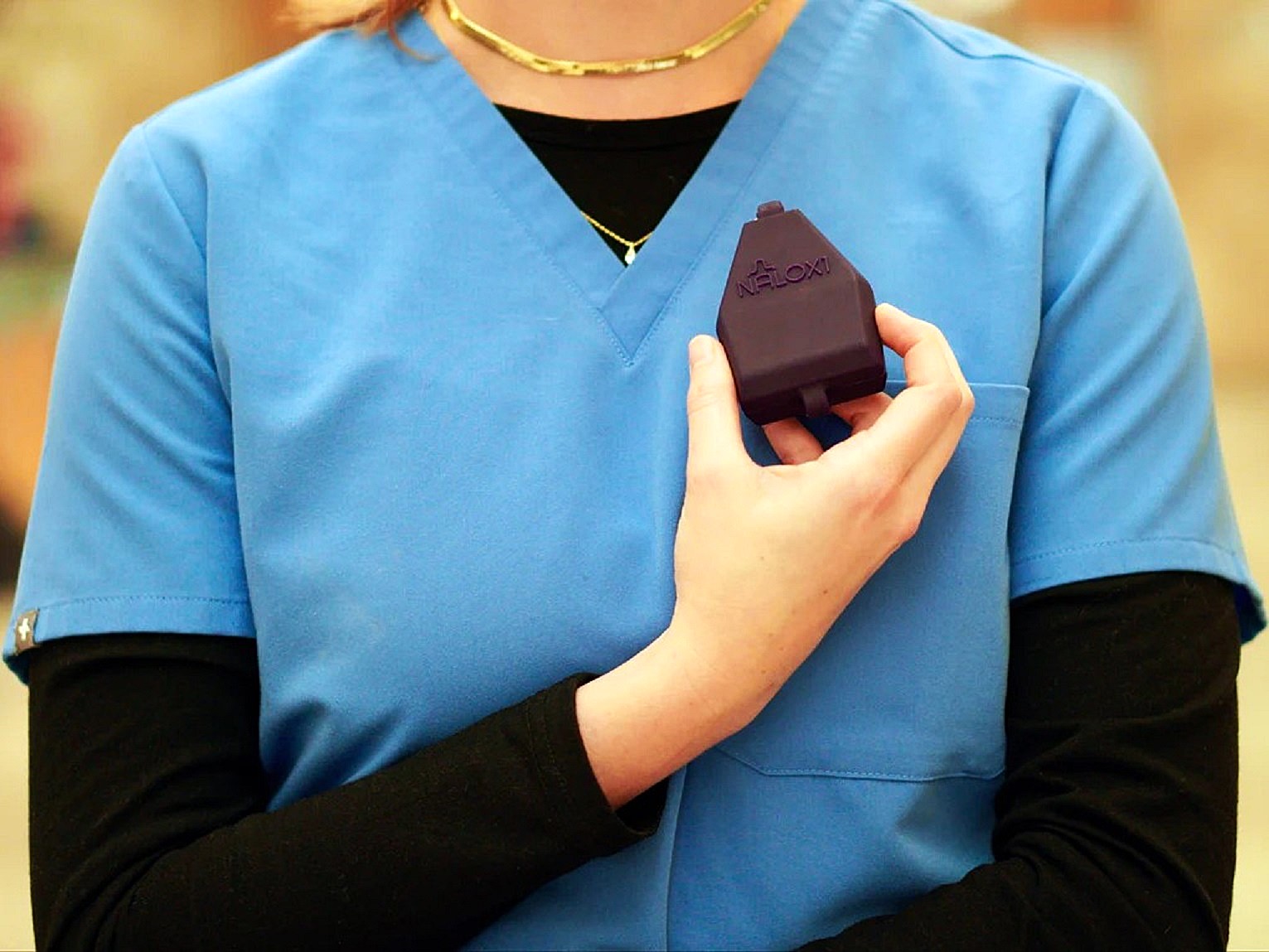 Nurse with Nalox1 Naloxone carry casy in hands for emergencies