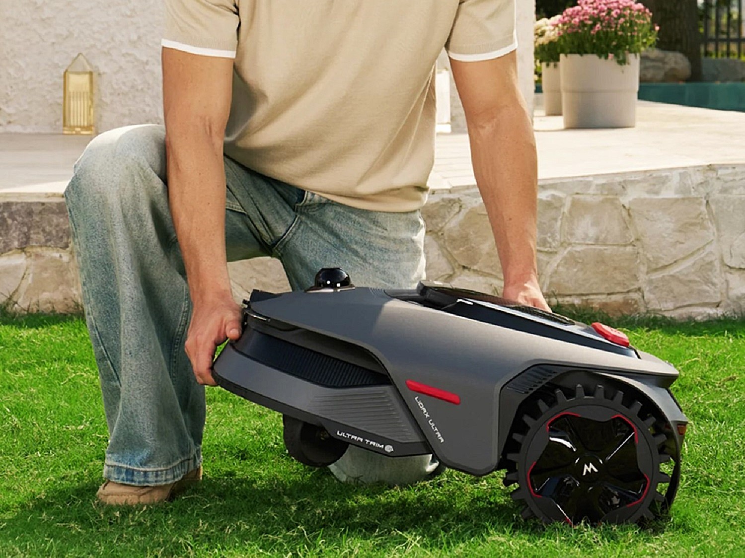 MOVA Lidax Ultra Series robotic mowers being lifted