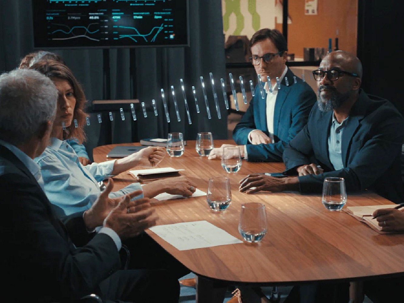 Man wearing Nuance Audio Hearing Glasses at meeting